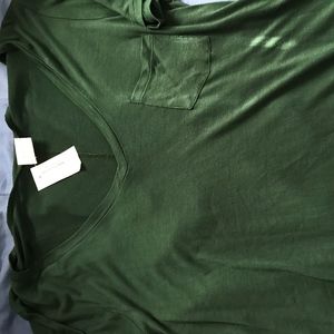 green v neck with pocket